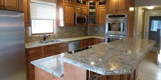 For a more traditional kitchen, pair the granite with cream cabinets that have lots of detail. Granite Countertops New Albany Oh The Granite Guy