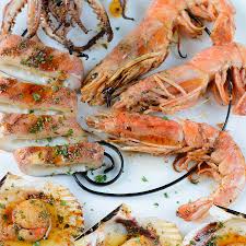 Now add in 2 eggs, the vegetable oil, and the buttermilk. Grilled Squid Shrimp And Oysters With Orange Paprika Dressing Recipe