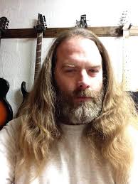 10 years apart . I might be getting a bit grey from the years of partying  like a rockstar , but I am not slowing down anytime soon .