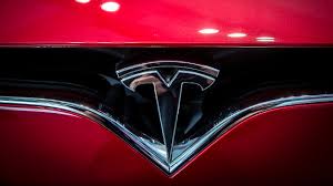 tesla stock tanks after companys larger quarterly loss