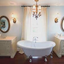 Well, you shouldn't be able to stand in your bathtub and change the lightbulb. Bath Chandelier Dos And Don Ts This Old House