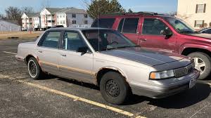 Image result for Light Rosewood 1995 Chrysler