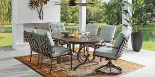 1 dining table, 8 dining chairs with arms; Aluminum Cast Aluminum Patio Dining Sets