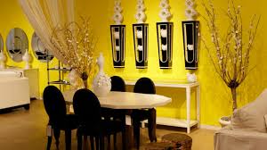 It also has a wooden dining table set with red chairs, lighted by a fancy ceiling light. 17 Bright And Pretty Yellow Dining Room Designs Home Design Lover