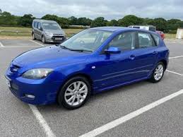 Image result for Electric Blue 2007 Mazda3
