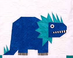 Everything is made from square and rectangular pieces sewn together using conventional patchwork techniques. Dinosaur Paper Pieced Quilt Pattern Made By Marney