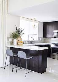 Black is a very versatile tone rta black kitchen cabinets are available in different shades and styles. 21 Black Kitchen Cabinet Ideas Black Cabinetry And Cupboards