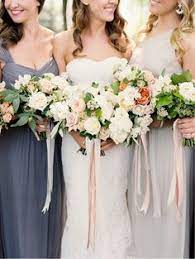 This hand gathered style bouquet has an old fashioned feel with pretty peonies and lots and lost of ribbons and love knots. 30 Bouquet Ribbon Treatments Ideas Bouquet Wedding Wedding Bouquets