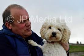 39257828-Reggie and owner Len Hanson together at Roker. Picture by FRANK  REID