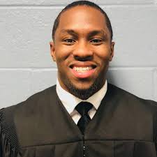 Swipe Left) At 27, Hanif Johnson...