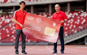 Loh kean yew poses with his thailand masters gold medal. Singtel Customers To Enjoy 5g Roaming In 13 Countries Bermuda News