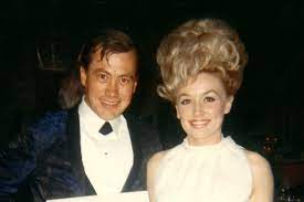Born the fourth child of 12, dolly grew up in… Dolly Parton Mourns Death Of Uncle Who Helped Launch Her Career