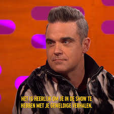 Robbie Williams vergelijkt de geboorte van zijn zoon met het afbranden van  zijn favoriete café... 🙄