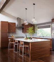 Apart from offering ample illumination, they seem to bring along with them beautiful balance and contemporary style. Kitchen Lighting Modern Kitchen Pendant Lights Bell Copper Traditional Wood Brown Isl Contemporary Kitchen Island Kitchen Island Lighting Modern Kitchen Island