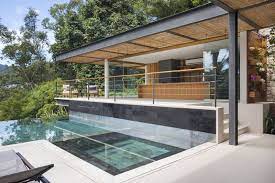 this pool house has picturesque views of the mountainous countryside modern pool house pool house house