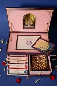 Photo Of Unique Wedding Invite Box With Cards Ganesha Idol And Favours Indian Wedding Invitation Box Wedding Gift Boxes Indian Wedding Invitation Cards