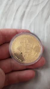 A logo for bitcoin, the first decentralized cryptocurrency. I Am Into Crypto Bought My First Bitcoin Am I Doing This Right Cryptocurrency