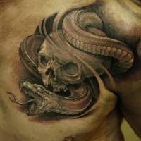 These tattoos are done using solid lines and black ink to create complex patterns. Snake On Cross Tattoo On Arm Tattooimages Biz