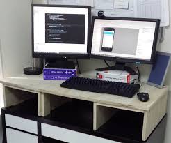 Diy standing desk converter diy, alternative to build an excellent solution ergonomic health information about its a readymade standing desk memory controller american walnut top black frame office furniture. Inspirational Diy Standing Desk Designs Everyone Can Build Painless Movement