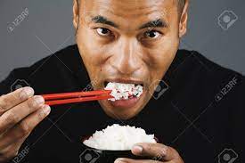 I learned this method from. Asian Man Eating Rice With Chopsticks Stock Photo Picture And Royalty Free Image Image 16093648