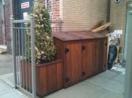 They also come in heights of 6 ft and 4 ft. Carpenter Or Handyman For Wood Trash Shed Brownstoner Garbage Shed Trash Shed Hide Garbage Cans