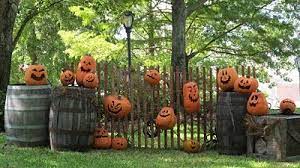 Carved pumpkins used for outdoor decor via nurserynotations. Universal Studios Their Pumpkin Displays Were Fantastic I Would Love To Do My Front Gate Halloween Outside Halloween Goodies Halloween Outdoor Decorations