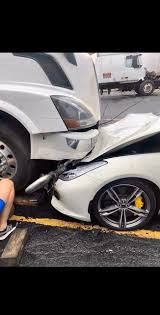 This specific one in chicago is currently wearing a giant semi truck on its hood as an ornament. Disgruntled Truck Driver Parks His Semi On Boss S Ferrari