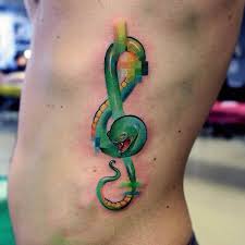 Oiseau roi, le plus important de la culture indienne, il symbolise la treize : 79 Tatouages De Clefs De Sol Et Leur Signification