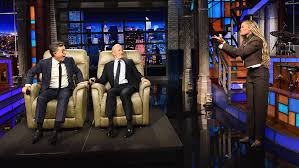 Jon Stewart Surprises Stephen Colbert With a Recliner and Guest Performer in Final ‘Late Show’ Appearance