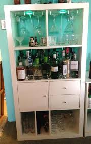 White Expedit Kallax 4x2 Bookshelf Ikea Hack Converted Into A Bar Though Can Easily Be Converted Back Into A Bookcase If Ikea Bucherschrank Ikea Ikea Ideen