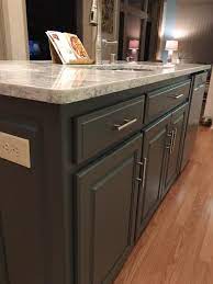 Here's another gorgeous kitchen with painted cabinets and a striking darker island… Rowan Revivals Stunning Painted Kitchen Island In Iron Mountain By Benjamin Moore Kitchen Painted Kitchen Island Laminate Cabinets Painting Kitchen Cabinets