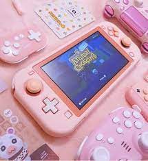 nintendo switch lite coral animal crossing in 2021 nintendo switch video game room design kawaii games
