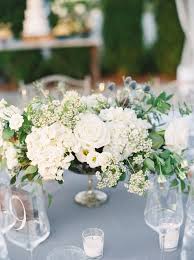 White And Green Low Centerpiece With Blue Thistle Green And White Wedding Flowers Wedding Floral Centerpieces Flower Centerpieces Wedding