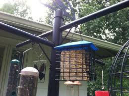 It's also strong enough to support hanging flower baskets, yard decorations, and insect repellents. Bird Feeder Pole Stops Squirrels From Reaching Seed