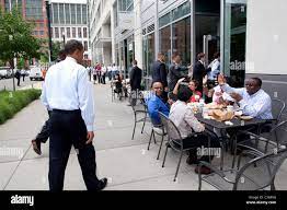 President Barack Obama walks towards the entrance of Five Guys in  Washington, D.C., during an unannounced lunch outing Stock Photo - Alamy