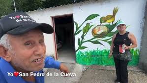 Don Benny is happy to have the hummingbird mural painted by Maria Tarazon. 