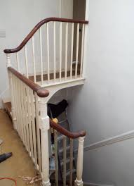 Interior stair railing materials now are: Mahogany Or Ebony The Great Handrail Debate My Lovely Money Pit