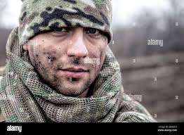 Soldier face mud hi-res stock photography and images
