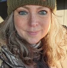 Trying to find out what style of vehicle this model T is. Was this built in  the ford factory which was downtown? Any idea where this might have been  taken. What does