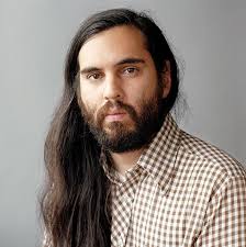 Assistant Professor Raymond Boisjoly takes part in Wood Land School