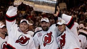 Martin Brodeur Ken Daneyko Patrick Elias Hoist The Stanley Cup After Defeating The Anaheim Mighty Ducks 6 9 2003 New Jersey Devils Ken Daneyko Nhl News