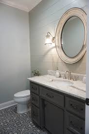 Farmhouse Style Half Bath Features Ship Lap Decorative Tile Floor Framed Mirror And Plumbing Fixtures All Des Custom Bathroom Custom Builder Decorative Tile
