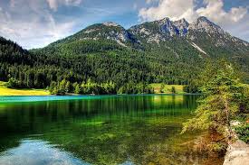 Huttenland Der Hintersteiner See Im Naturschutzgebiet Wilder Kaiser Ist Ein Glasklarer Gebirgssee Und Bietet Herrliche Ausbli Tirol Naturschutzgebiet Ausflug