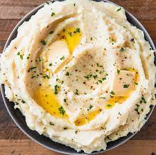 Muffin tin potatoes gratin on a white dish with parsley garnish. 20 Best Prime Rib Sides Side Dishes For Prime Rib Ideas