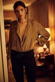 ( 7) john mark lace back ruffle fringe sleeve wire neck twist front blouse. Women S Gold Button Down Blouse Black Skinny Pants Gold Earrings Lookastic