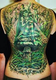 Green Gothic Fairy Girl Sitting On Mushroom Tattoo On Full Back For download click on the button below.