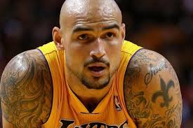 Robert Sacre ,Los Angeles Lakers's player, he has a Chinese character  tattoo