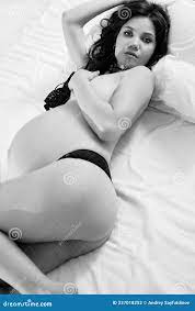 Attractive Pregnant Woman in Bed in Underwear. Stock Photo - Image of  medical, attractive: 237018252