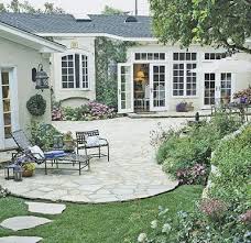 21 Patio Ideas For An Inviting Outdoor Space You Ll Never Want To Leave Stone Patio Designs Patio Design Backyard Patio