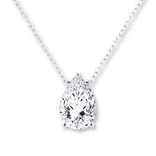 A bright sunshiny pear shape diamond, weighing 1.03 carats, beams brilliantly from within a simple setting crafted in 18k rose gold. Diamond Solitaire Necklace 1 Carat Pear Shaped 14k White Gold Jared